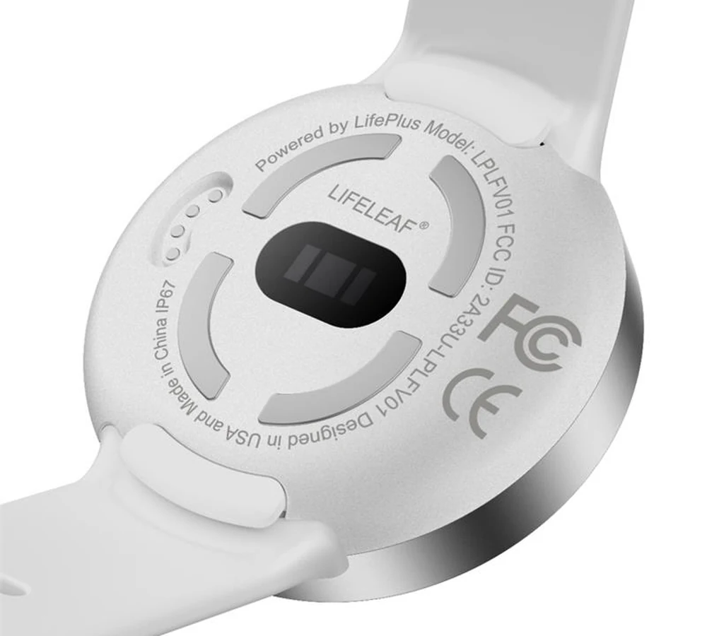The underside of the LifeLeaf watch, showing the optical sensor cluster that reads blood sugar and blood pressure through the skin.