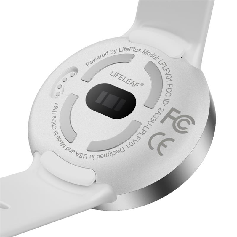 The underside of the LifeLeaf watch, showing the optical sensor array and charging contacts.